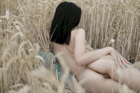 Breathtaking amateur babe Lyalya massages her big tits in a wheat field