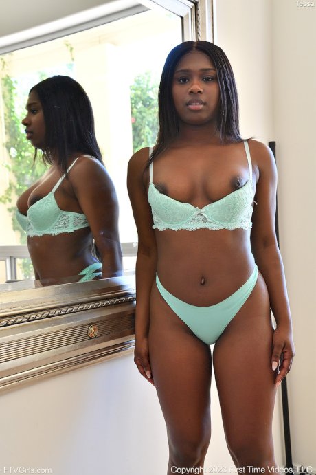 Hot black girl Tessa removes her lingerie before inserting a sex toy