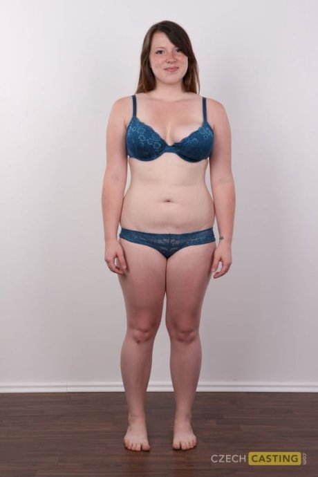 Chubby redhead undresses to stand naked and show her big tits and big butt - Photo 7