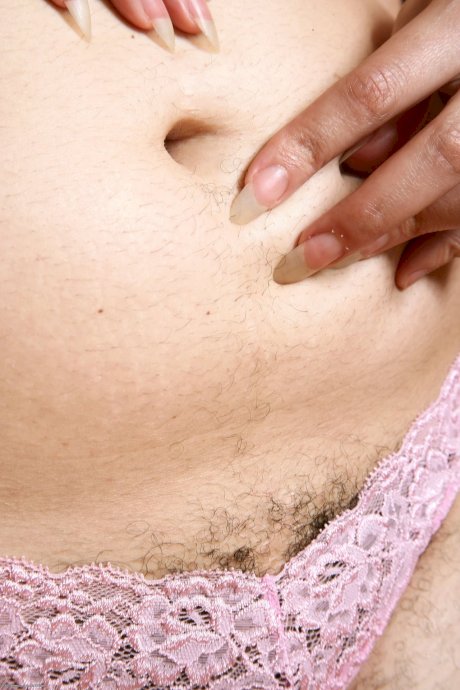 Sexy brunette amateur Marie spreads her hairy pussy after a striptease - Photo 13