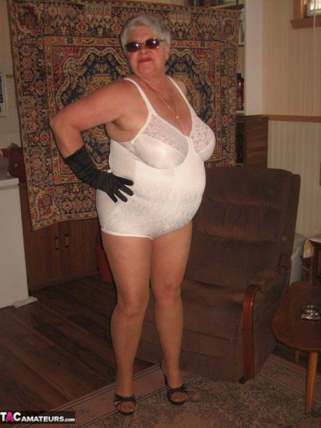 Fat granny Girdle Goddess gets naked in shades, gloves and pantyhose