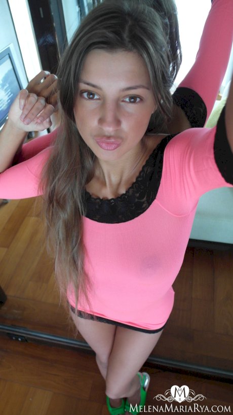 Russian beauty Malena Tara takes selfies as she strips and poses