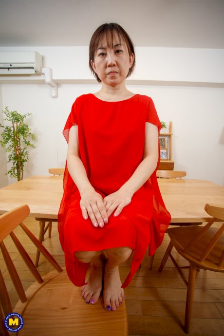 Japanese mom Yuki Kozakura posing in her red dress and panties in a solo
