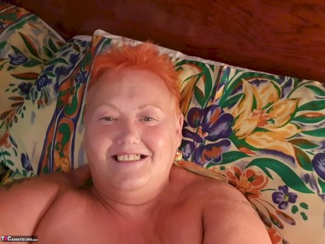 Fat granny with red hair Valgasmic Exposed takes naked selfies at home