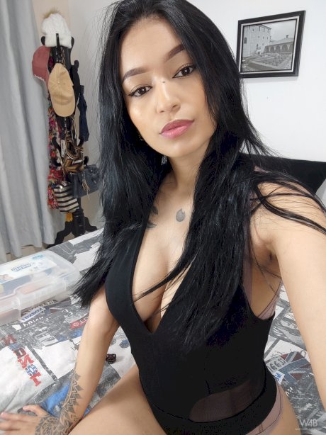 Latina babe Alexa Belluci flashes her juicy tits while teasing in sexy outfits