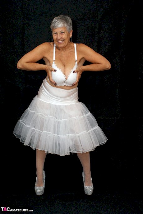 Brazen plump granny Savana flashes panty upskirt in tutu & sparkly high heels
