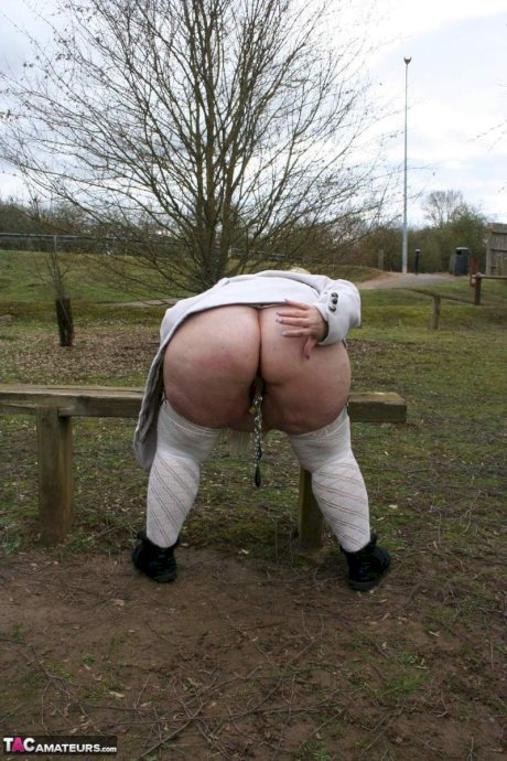 Obese British lady Lexie Cummings flashes while at a public park