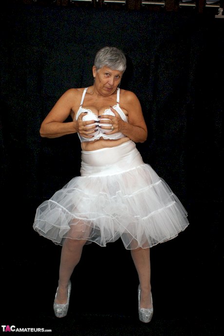 Brazen plump granny Savana flashes panty upskirt in tutu & sparkly high heels