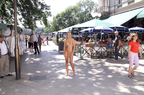 Blonde teen Krisztina removes her yellow dress and flaunts her body in public - Photo 18