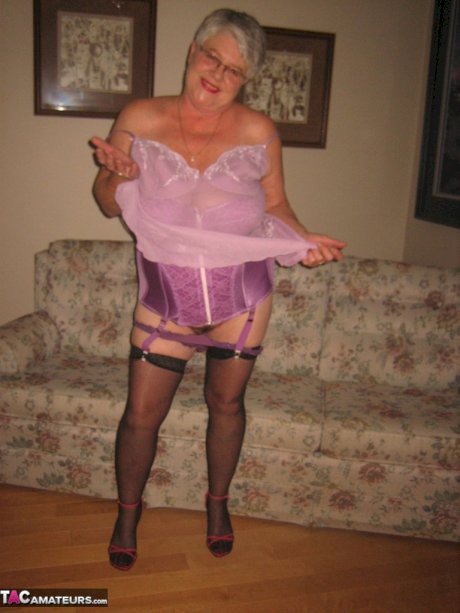 Fat granny Girdle Goddess lets her large boobs loose from lingerie