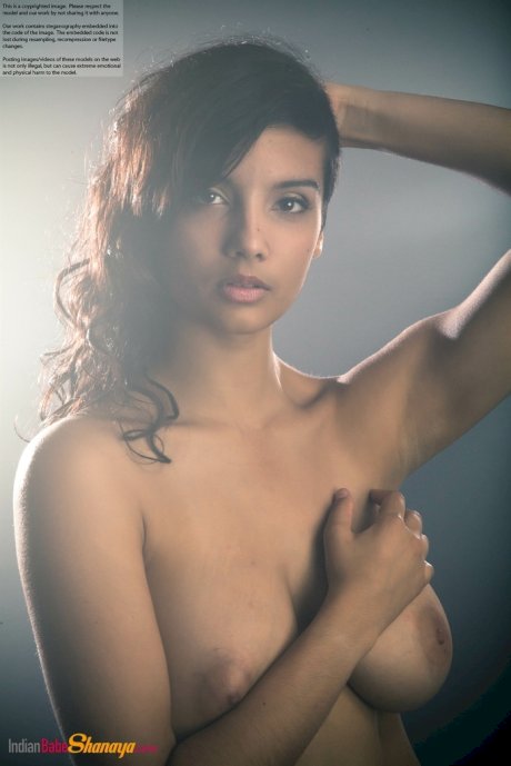Beautiful Desi female removes her dress to expose her big natural boobs