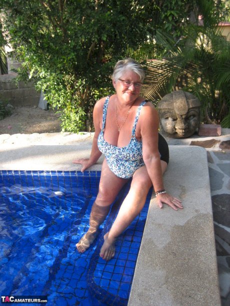 Fat nan Girdle Goddess goes for a skinny dip in a backyard pool