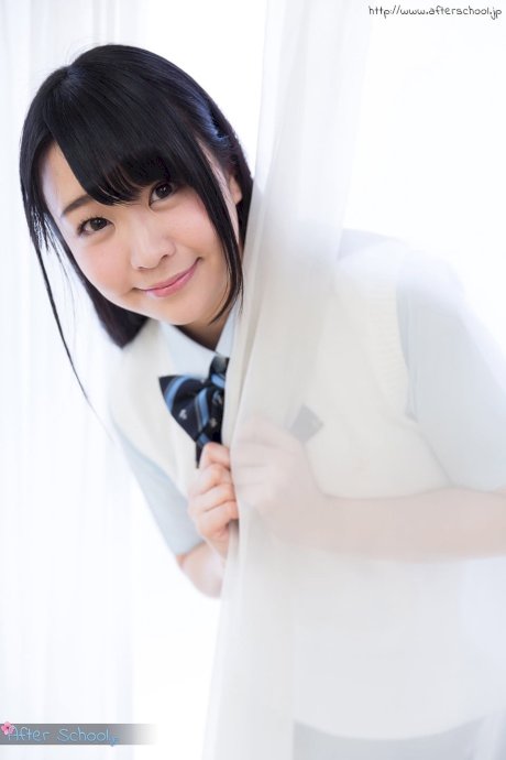 Horny Asian schoolgirl lifts up her skirt and masturbates - Photo 2