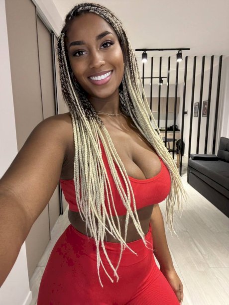 Ebony solo model Laila Santiagoo sports a nice smile during SFW action