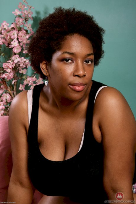Chubby ebony teen Misty unleashes her big tits & spreads her hairy pussy
