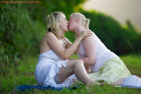 Young blondes Anneke and Sue-Ann make love during outdoor lesbian sex