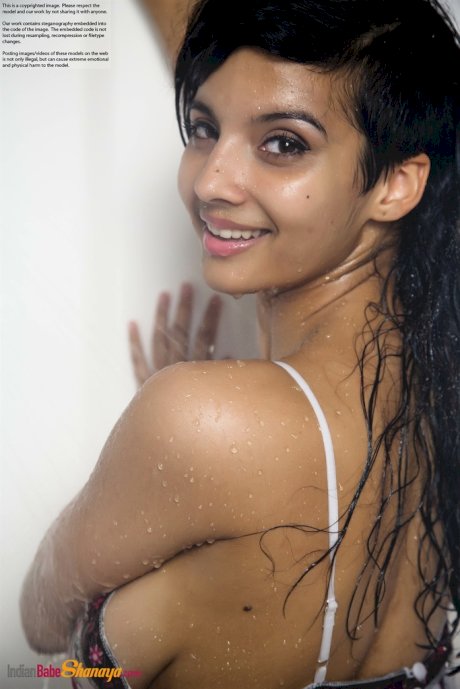 Indian solo girl takes off her wet dress to pose nude in the bathtub