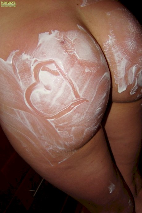 Amateur hottie Vanessa Lovely creams and fondles her big juggs while stripping