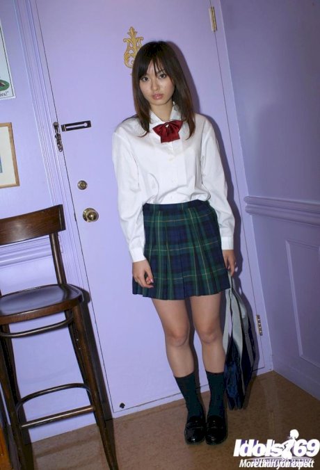 Naughty asian schoolgirl Hikaru Koto slipping off her uniform - Photo 1