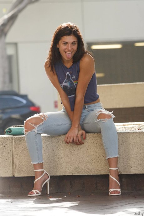 Teen girl Leah Gotti flashes a boob after posing non nude in ripped jeans - Photo 5