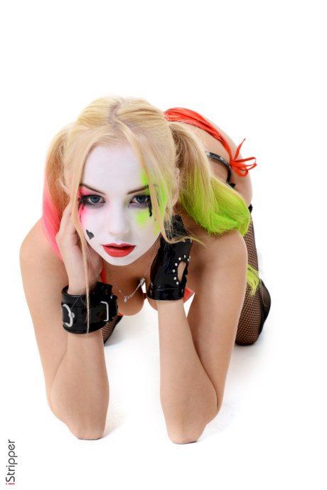 Solo girl with a painted face strips naked after putting down her baseball bat