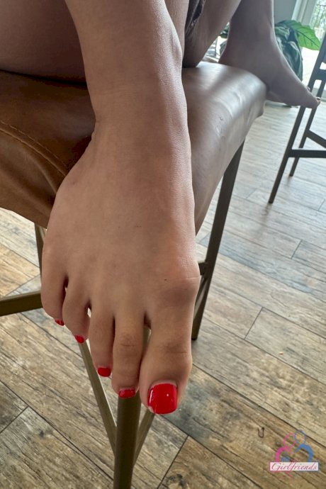 Amateur girl with red fingernails highlights her bald pussy in a red dress related porn gallery