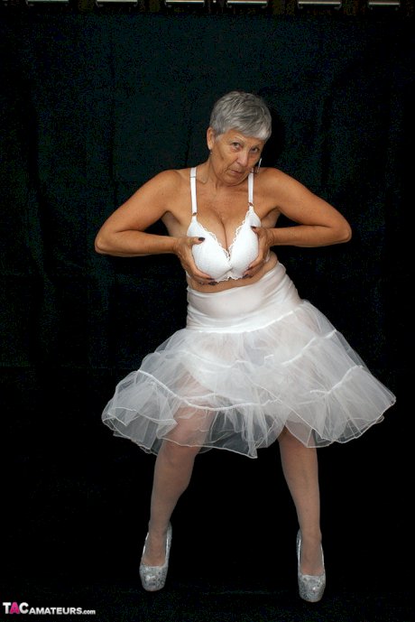 Brazen plump granny Savana flashes panty upskirt in tutu & sparkly high heels