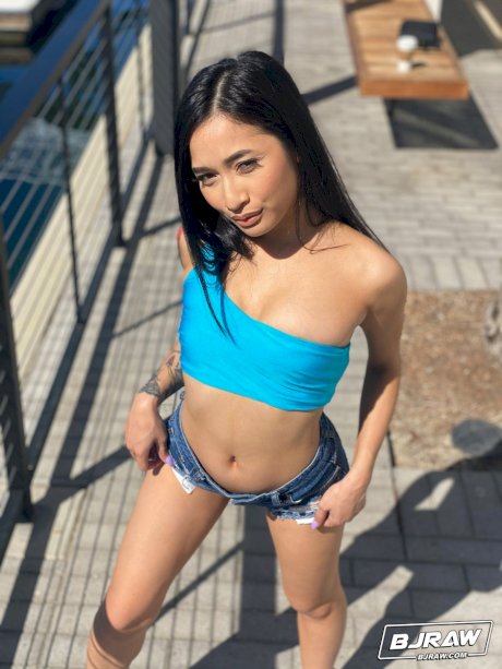 Tiny Asian girl Avery Black exposes herself outside a condo before giving head