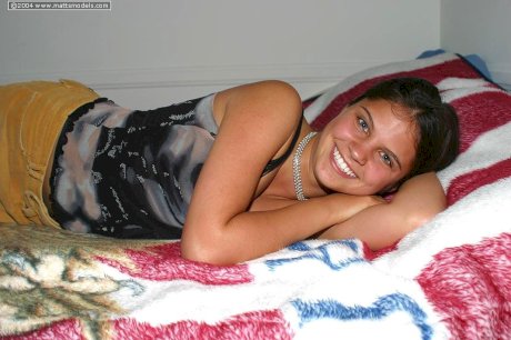 Teen first timer sucks her thumb before showing her trimmed bush in the nude - Photo 3