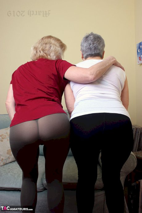 Old lesbians suck on each others boobs after modeling fully clothed