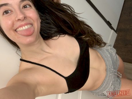 Brunette amateur takes selfies while getting naked in front of a mirror
