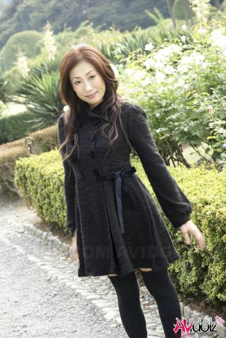 Fully clothed Japanese teen models in the park in black clothes and stockings