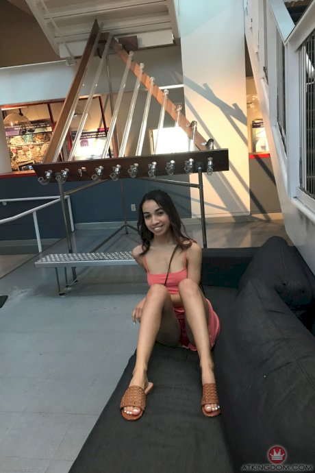 Brunette teen Jackie Rogen bends over & shows her exotic pussy from the rear