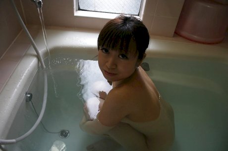 Asian teen Yuka Takagi taking bath and exposing her fuckable body