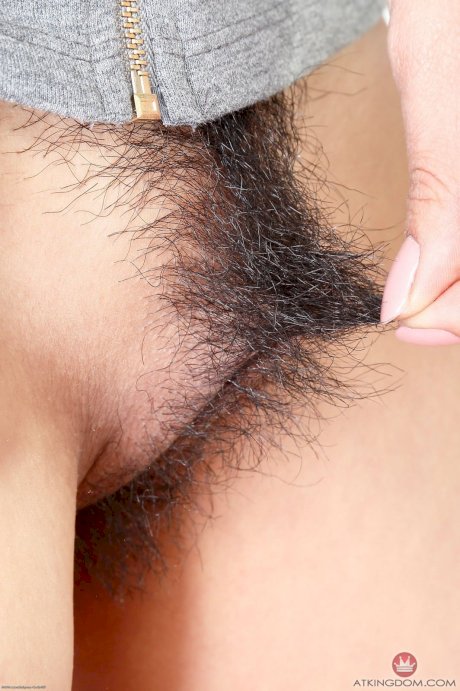 Petite Asian babe Saya Song spreads her welcoming hairy pussy up close porn pics
