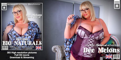 British fatty Dee Melons unleashes her giant boobs before toying her cunt