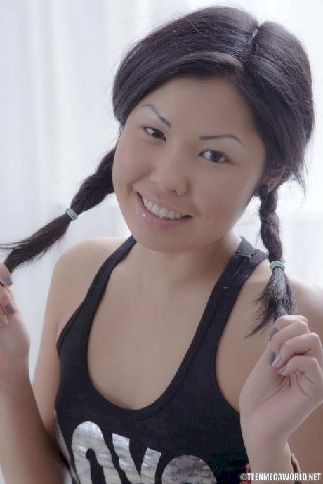 Cute Asian teen Veiki has sex with her masseur while sporting pigtails - Photo 10