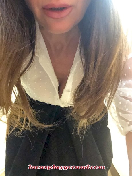 Hot MILF Lara shows her big boobs while trying on various sexy lingerie sets