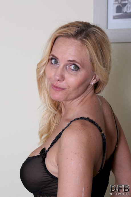 Hot mature Klara exposes her perfect breasts and stretches her love holes
