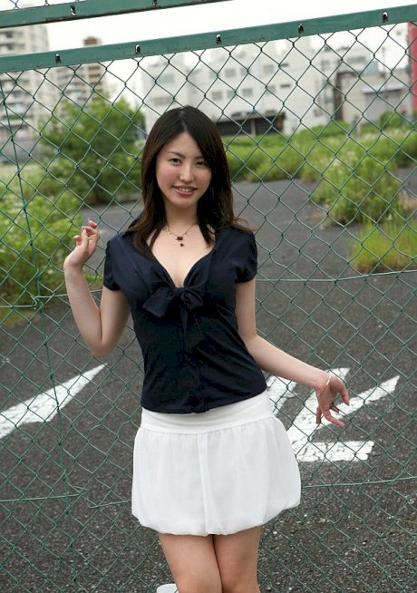 Japanese teen Takako Kitahara exposes upskirt panties on slide at playground
