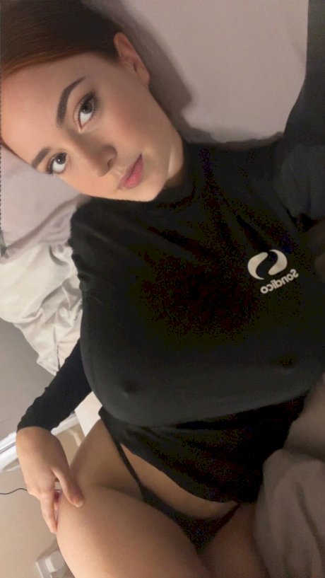 Adorable blue eyed teen with huge juggs Brooke Mills poses in a tight shirt