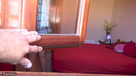 Sexy nan Abby Roberts sheds satin lingerie and stiletto heels to gets naked