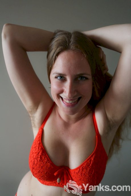 Busty redhead babe in sexy lingerie Nichole shows her curves and bushy twat