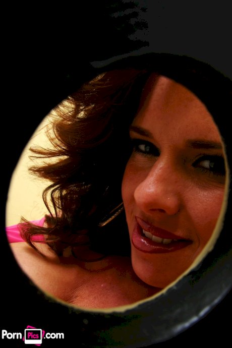 Salacious Veronica Avluv airs her big tits & sucks a cock through a gloryhole