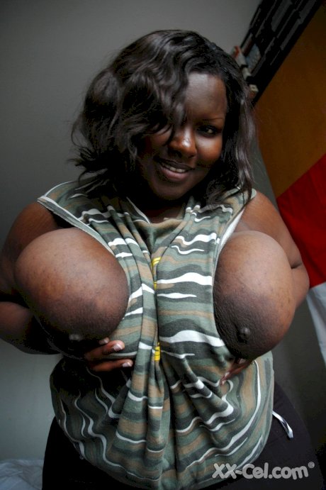 Fat black woman Mariana Kodjo showing off her extra-large natural tits
