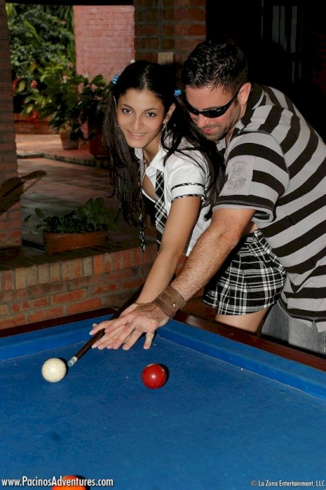Schoolgirl Michelle loses at a game of pool and has to give a blowjob