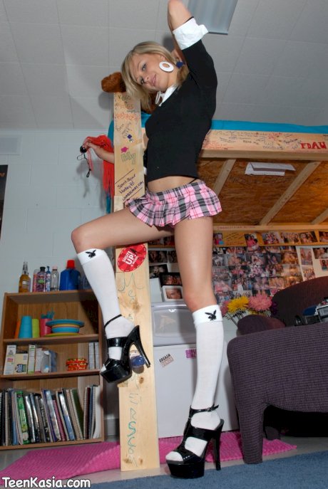 Cute blonde teen Kasia shows her hot ass in a thong and microskirt - Photo 11
