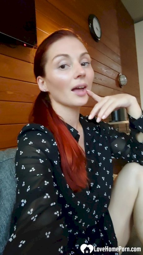 Gorgeous redhead shows off her big tits & her tattoos while taking nudes