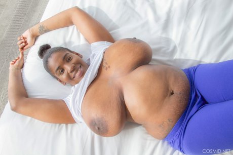 Thick black chick unleashes her huge saggy boobs in her underwear