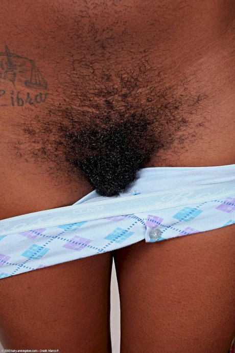 Ebony cheerleader Jordan Lover parts her bush after showing her beaver - Photo 9